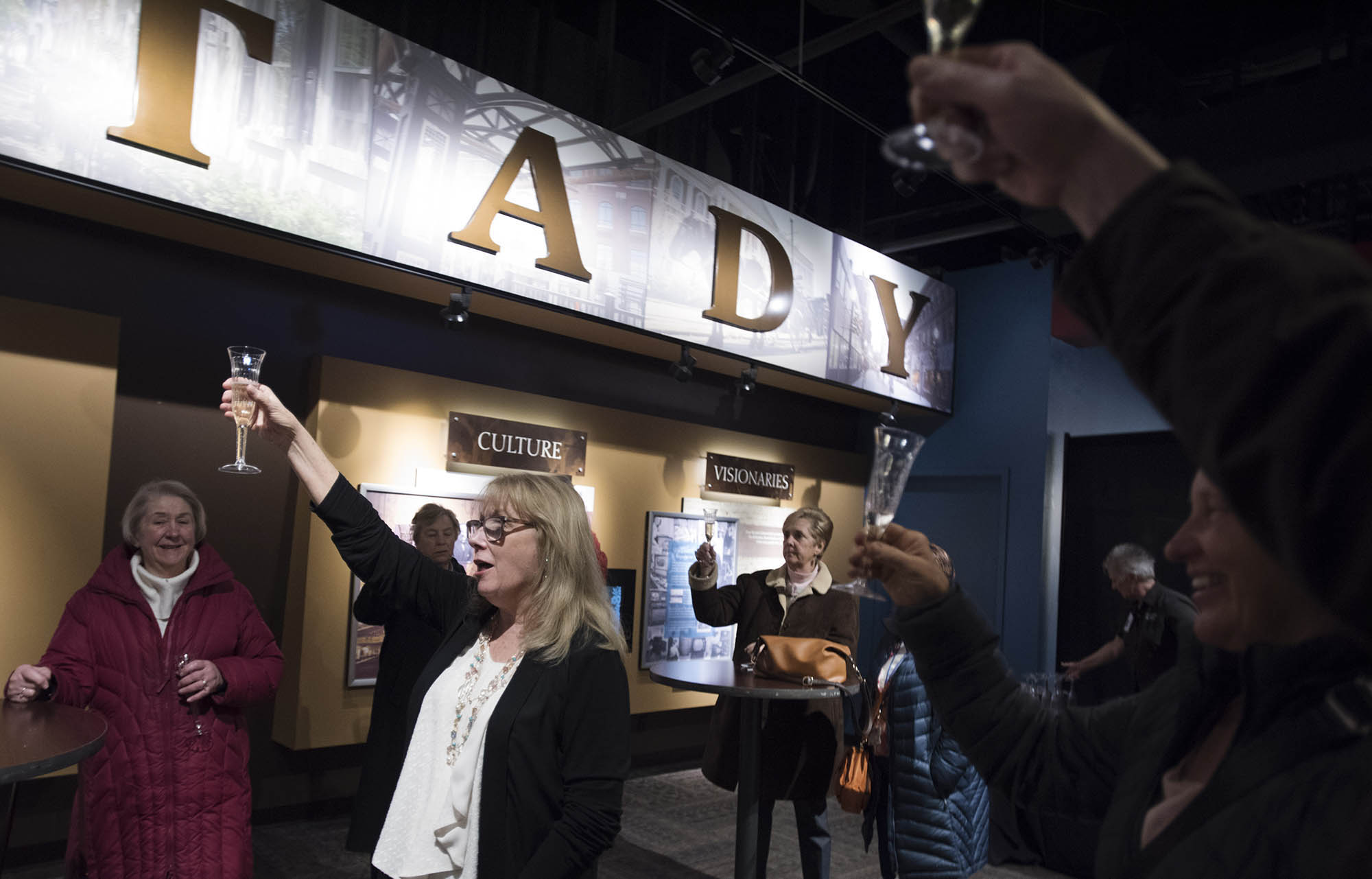 Maggie Mancinelli-Cahill leads a champagne toast for subscribers from theREP in Robb Alley before opening night of The Humans at Proctors Tuesday, March 7, 2018.